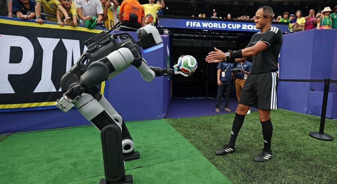 Atlas delivers the ceremonial match ball to the referee.