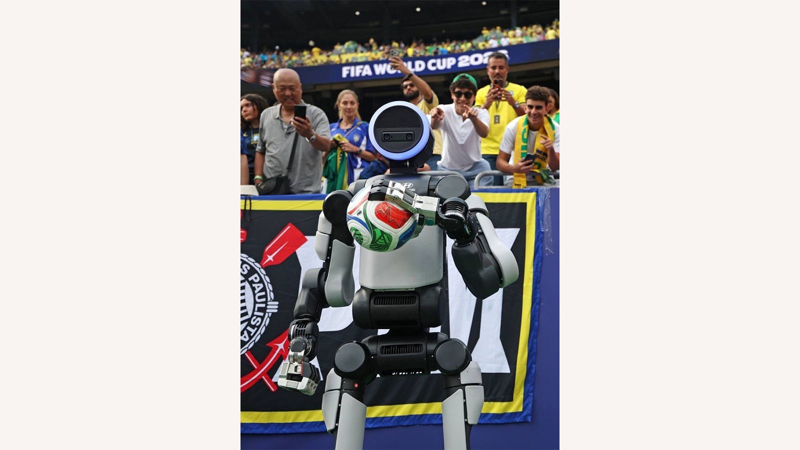 Atlas prepares to deliver the ceremonial match ball.