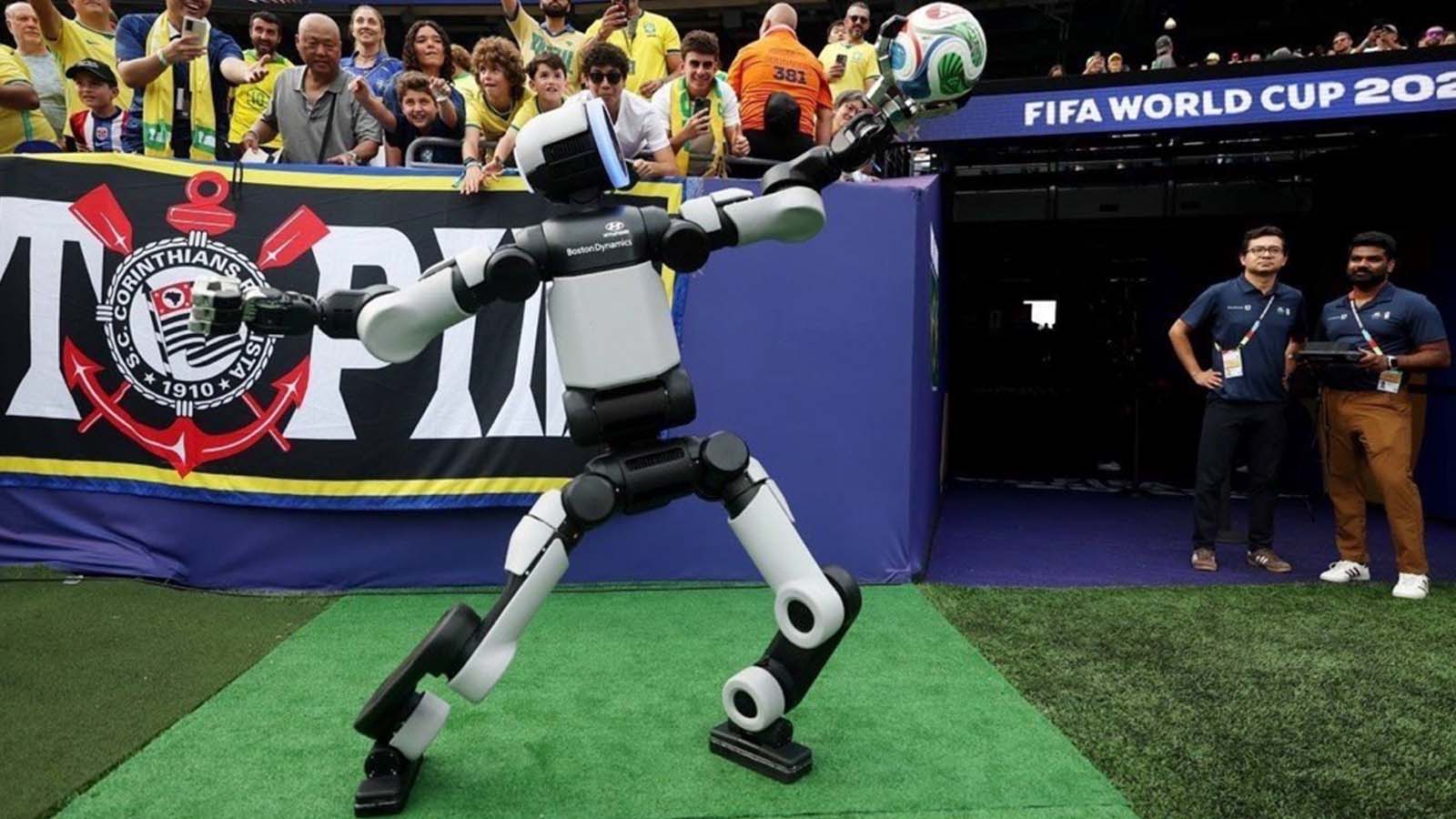 Atlas celebrates after delivering the ceremonial match ball.
