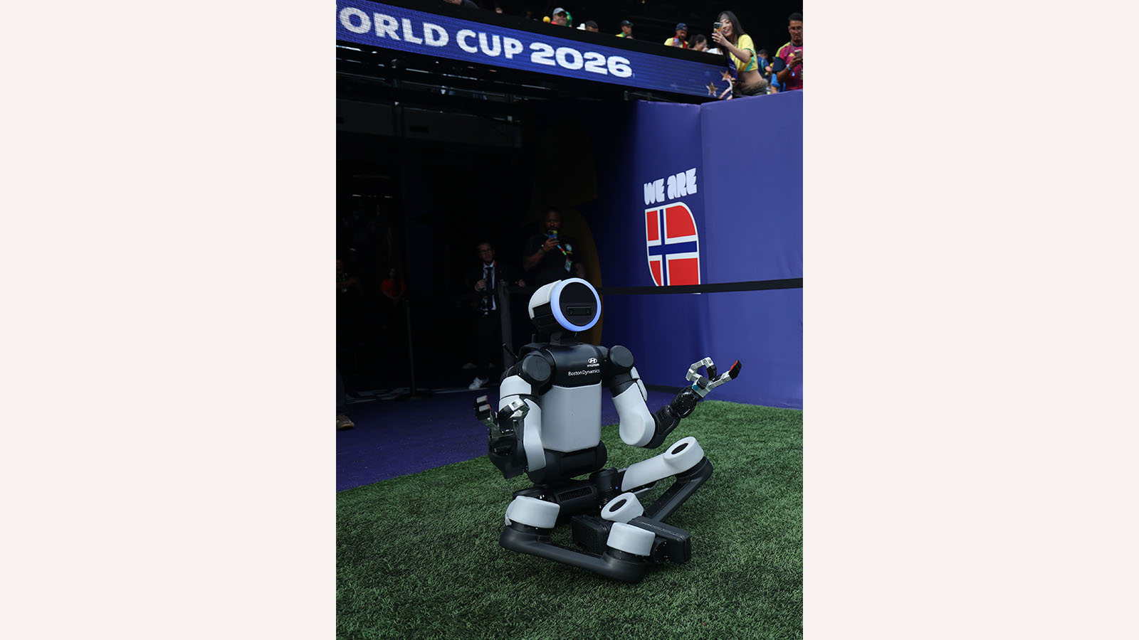 Atlas performs Erling Haaland’s signature goal celebration.