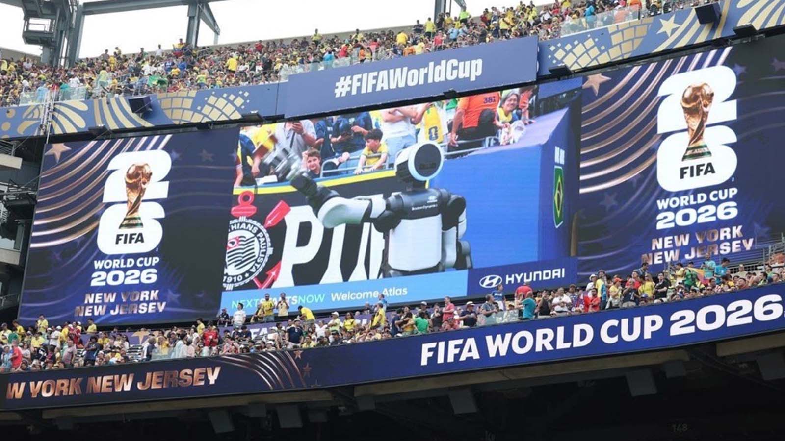 Atlas greets the crowd through the stadium giant screen.