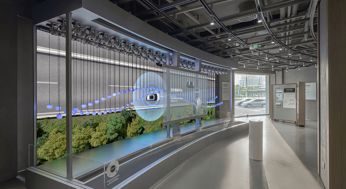 The UX Explorer Zone features a tech-vision platform with transparent LED displays and kinetic installations, demonstrating Hyundai Motor Group's vision for the future of mobility.