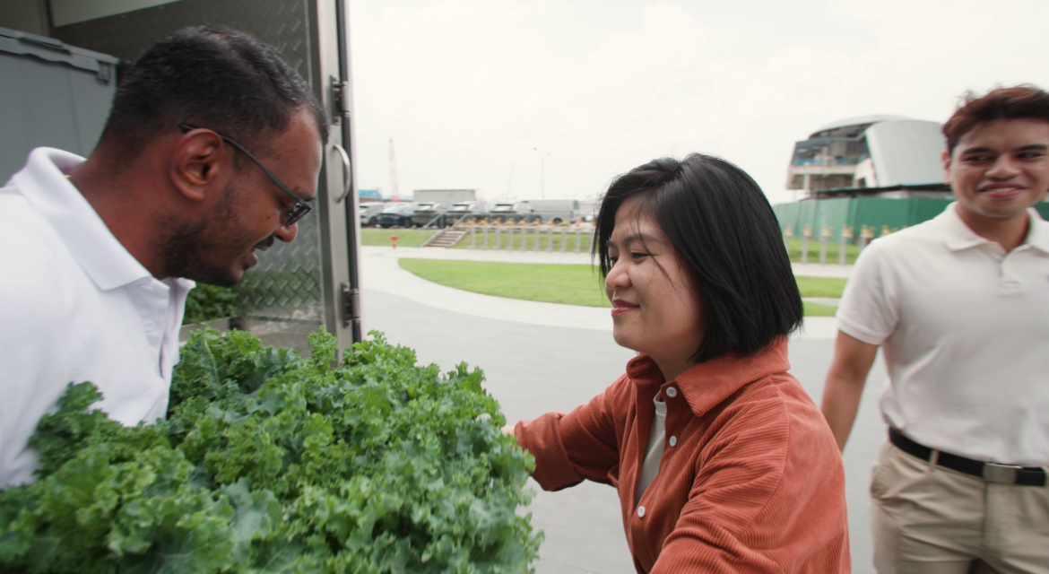 “Each week, a refrigerated food truck arrives at HMGICS to collect the vegetables and transport them to a Thye Hua Kwan Moral Charities (THKMC) distribution center.”